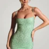 Aellin pyntet bodycon-minikjole i pistasj