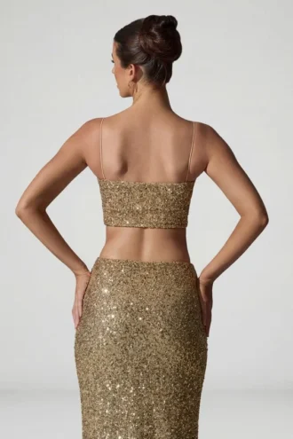 Ariana pyntet crop-top med utskjæringer i gull