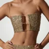 Ariana pyntet crop-top med utskjæringer i gull