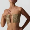 Ariana pyntet crop-top med utskjæringer i gull