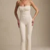 Arlena jumpsuit med blonder og sløyfe i elfenben