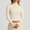 Auri Modal Ruched Backless Turtleneck Top i elfenben