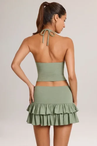 Azaria Modal Ruffle Mid-Rise Mini Skort i salviegrønn