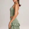 Azaria Modal Ruffle Mid-Rise Mini Skort i salviegrønn