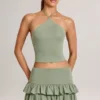 Azaria Modal Ruffle Mid-Rise Mini Skort i salviegrønn