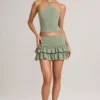Azaria Modal Ruffle Mid-Rise Mini Skort i salviegrønn