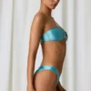 Bandeau-bikinitopp med ferskvannsperledetaljer i turkis