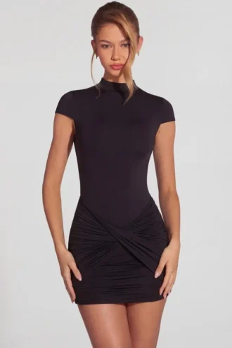 Blair Jersey Turtleneck Ruched Backless Minikjole i svart