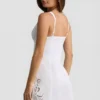 Calina A-linje minikjole i bomullspoplin med utskjæringer i hvitt
