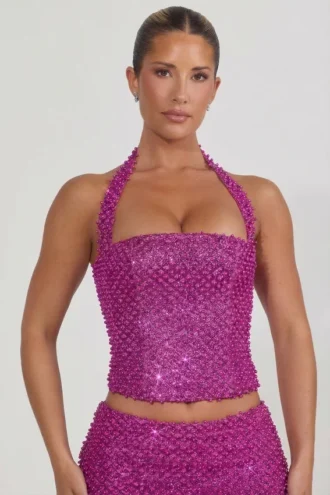 Caralie pyntet halterneck-korsett-top i magenta