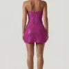 Caralie pyntet halterneck-korsett-top i magenta