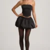 Clemmy Bubble Hem Mid-Rise Mini Skjørt i svart