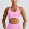 Define Luxe halterneck-sport-BH i bubblegumrosa