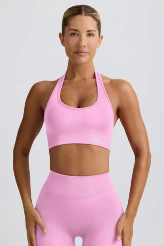 Define Luxe halterneck-sport-BH i bubblegumrosa