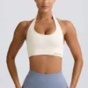 Define Luxe sports-BH med halterneck i hvit