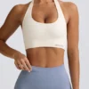 Define Luxe sports-BH med halterneck i hvit