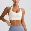 Define Luxe sports-BH med halterneck i hvit