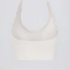 Define Luxe sports-BH med halterneck i hvit