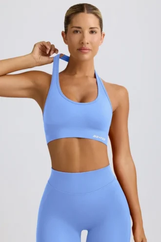 Define Luxe sports-BH med halterneck i lyseblå
