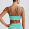 Define Luxe sports-BH med V-hals i mint