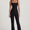 Elanie jumpsuit med rund hals, korsett og utvidede ben i svart