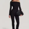 Erisen Modal off-shoulder jumpsuit med lange ermer i svart