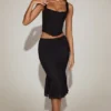 Fjolla Lace Mid-Rise Fluted Midi Skjørt i svart