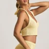 Gianna Bouclé halterneck-crop-top i gult