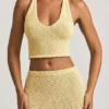 Gianna Bouclé halterneck-crop-top i gult