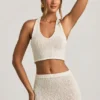 Gianna Bouclé halterneck crop top i hvitt