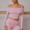 Gjennomsiktig off-shoulder-top med lange ermer i myk rosa