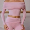Gjennomsiktig off-shoulder-top med lange ermer i myk rosa