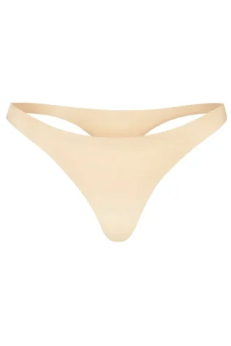 Intimates sømløs strikket tanga i varm fersken