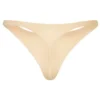 Intimates sømløs strikket tanga i varm fersken