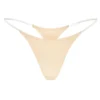 Intimates sømløs strikket tanga med gjennomsiktige stropper i varm fersken