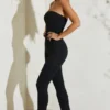 Jamila stroppeløs jumpsuit med utvidet kant i svart