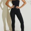 Jamila stroppeløs jumpsuit med utvidet kant i svart