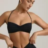 Jerika Slinky Jersey-bralette med metallbeslag og halterneck i svart