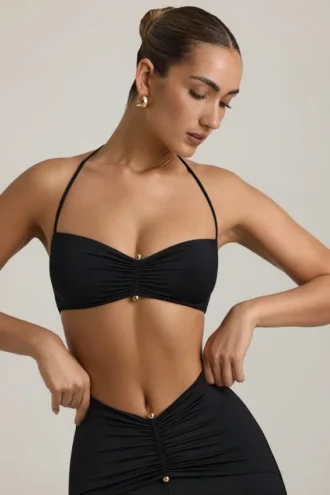 Jerika Slinky Jersey-bralette med metallbeslag og halterneck i svart