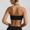 Jerika Slinky Jersey-bralette med metallbeslag og halterneck i svart