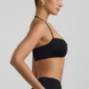 Jerika Slinky Jersey-bralette med metallbeslag og halterneck i svart
