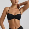Jerika Slinky Jersey-bralette med metallbeslag og halterneck i svart