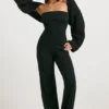 Jumpsuit i grovstrikket bandeau med utvidet ben i svart