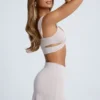 Kira Crop Top med utskjæringer og metallbeslag i skygrå