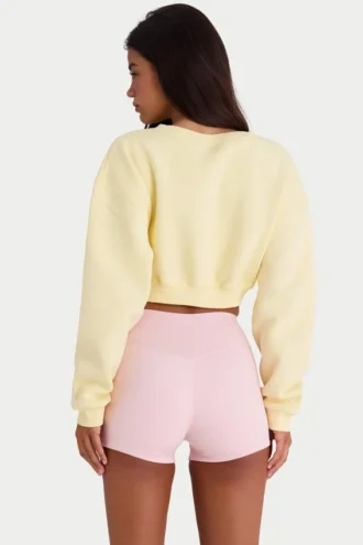 Kort cardigan i børstet jersey med knapper i myk gul
