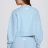 Kort strikket cardigan i pudderblått