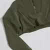 Kort sweatshirt i bomullsjersey med syrevask i lysegrønn