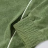Kort sweatshirt i frotté med glidelås i grønt