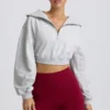 Kort sweatshirt med kvart glidelås i grå melert