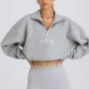 Kort sweatshirt med kvart glidelås i grå melert